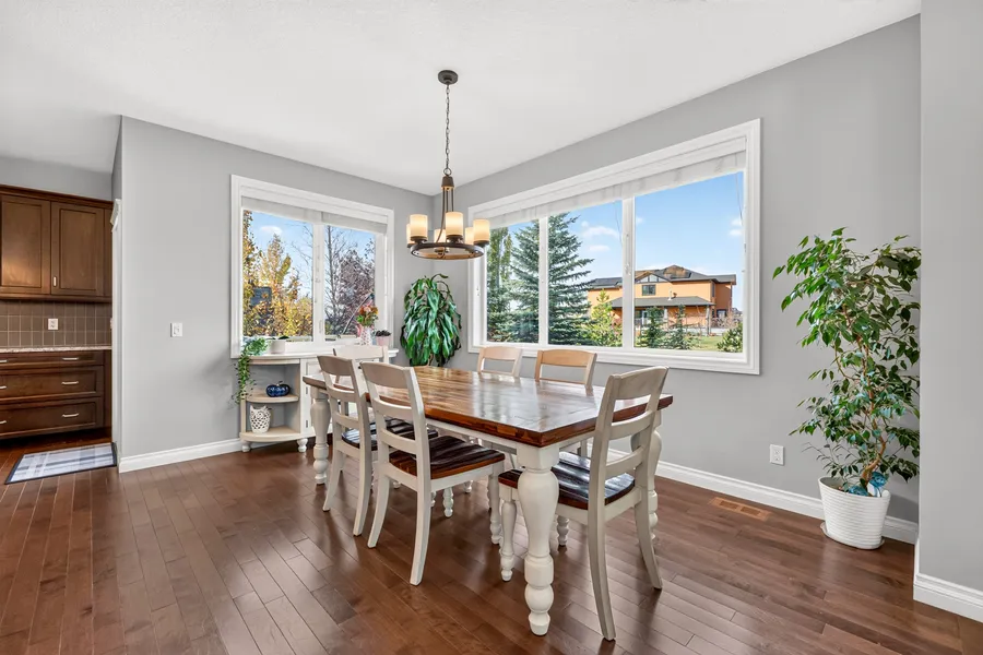 Dining area with backyard windows